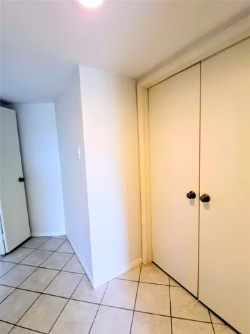 a bathroom with a sink a mirror and a shower