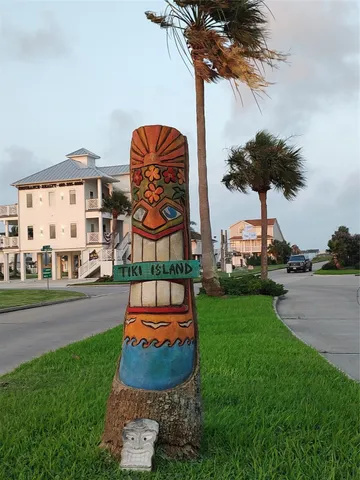 a view of a swimming pool table and chairs