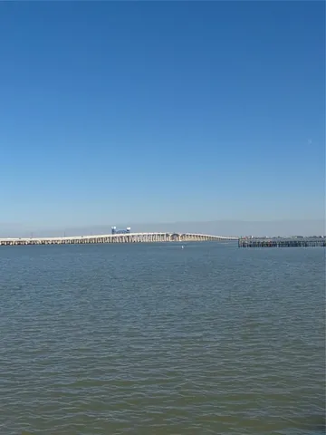 a view of balcony with wooden floor