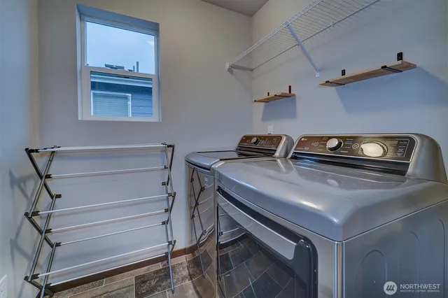 a view of kitchen with sink and cabinets