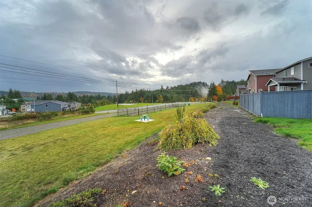 a view of a house with a big yard