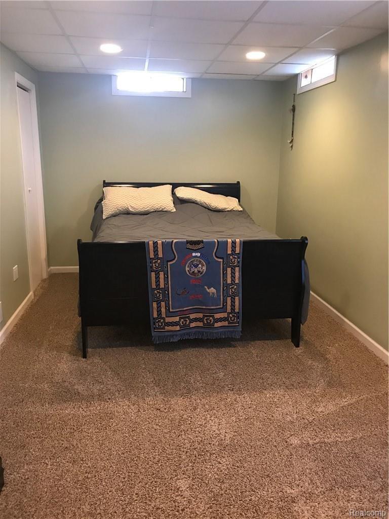 7582 West Beard Road Perry, MI 48872 - Photo 20 of 35 Bed 3 in basement, nice size space with great closet space!