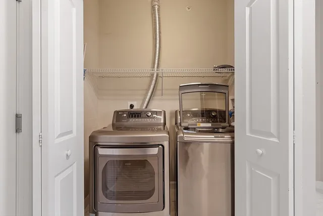 a view of a stove top oven and sink