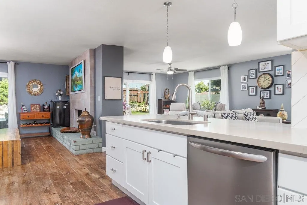 6205 Ruby Lake Avenue San Diego, CA 92119 - Photo 12 of 25 a kitchen with sink and window