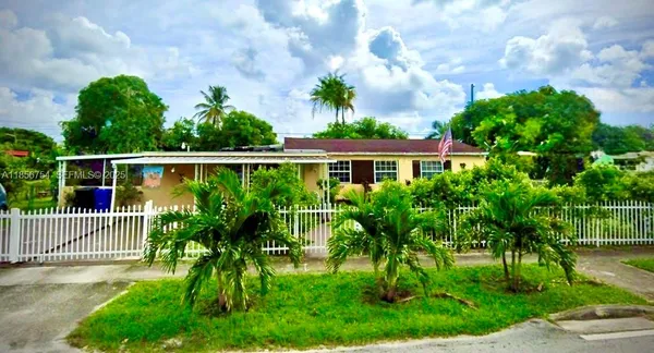 a house view with a garden space