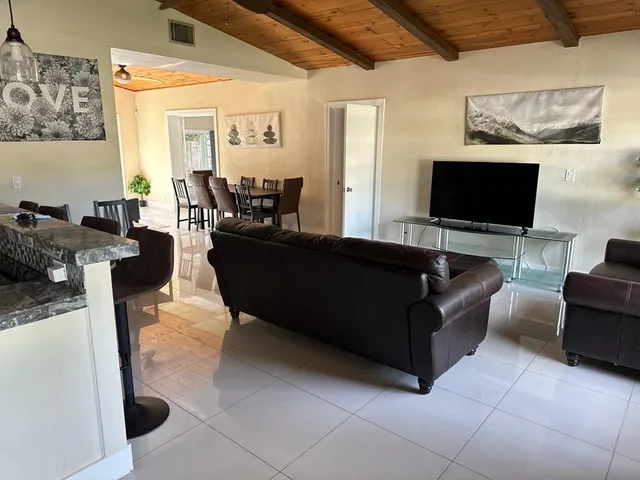 a view of swimming pool with a yard