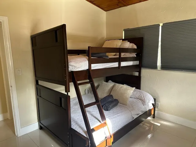 a bedroom with bunk bed