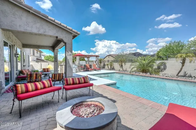 a view of a dining room that has a table and chairs