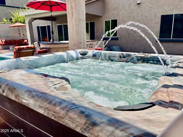 a view of balcony with wooden floor