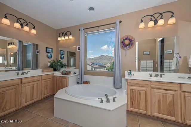 a view of a hallway to a livingroom with furniture