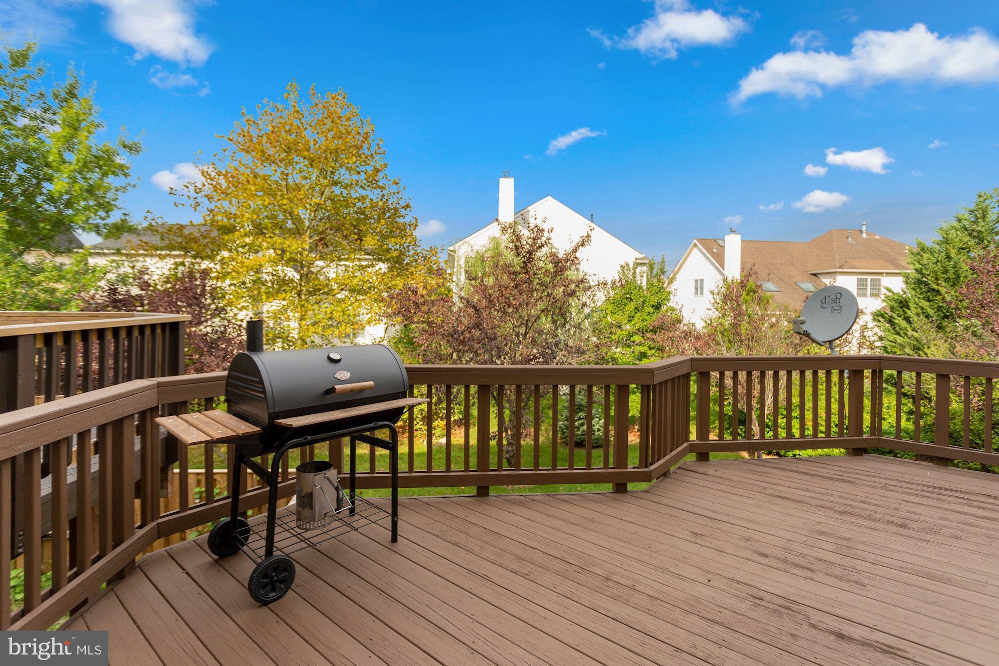 25272 McIntyre Square South Riding, VA 20152 - Photo 17 of 51 Expansive Deck off the Kitchen
