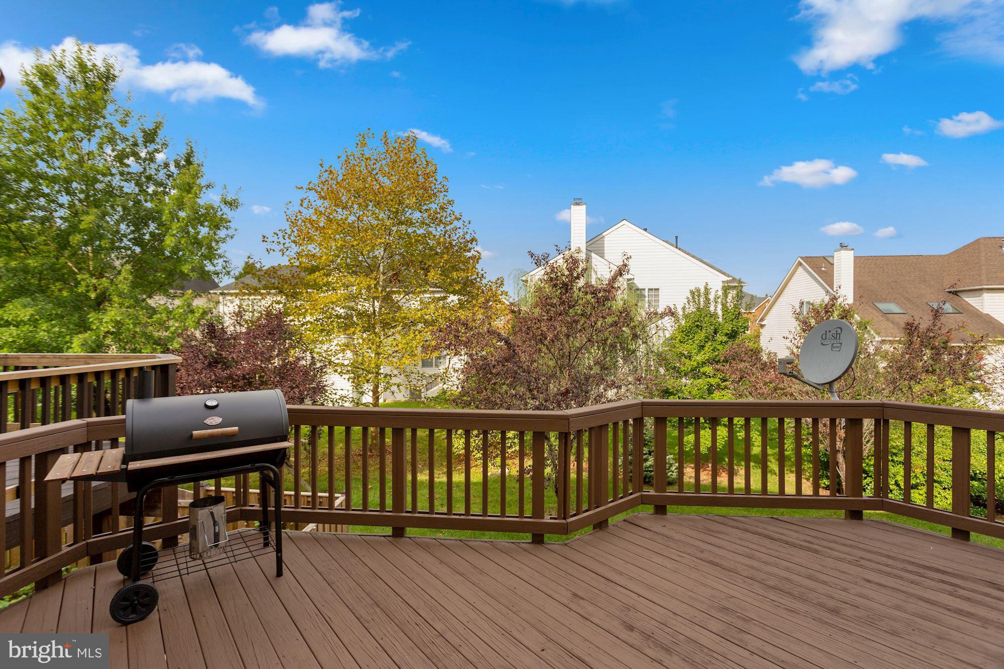 25272 McIntyre Square South Riding, VA 20152 - Photo 20 of 51 Expansive Deck off the Kitchen