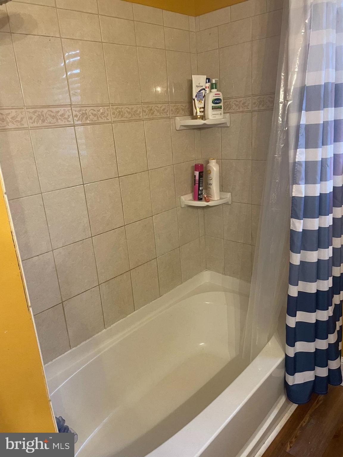 1101 Prospect Lane Somerdale, NJ 08083 - Photo 14 of 41 a bathroom with a bathtub and a shower