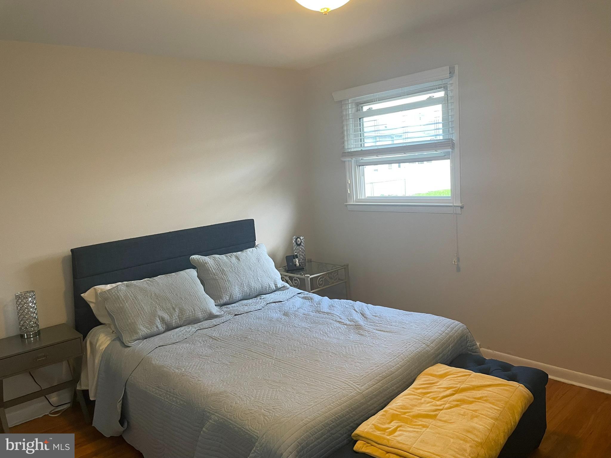 1101 Prospect Lane Somerdale, NJ 08083 - Photo 17 of 41 a bed sitting in a bedroom next to a window