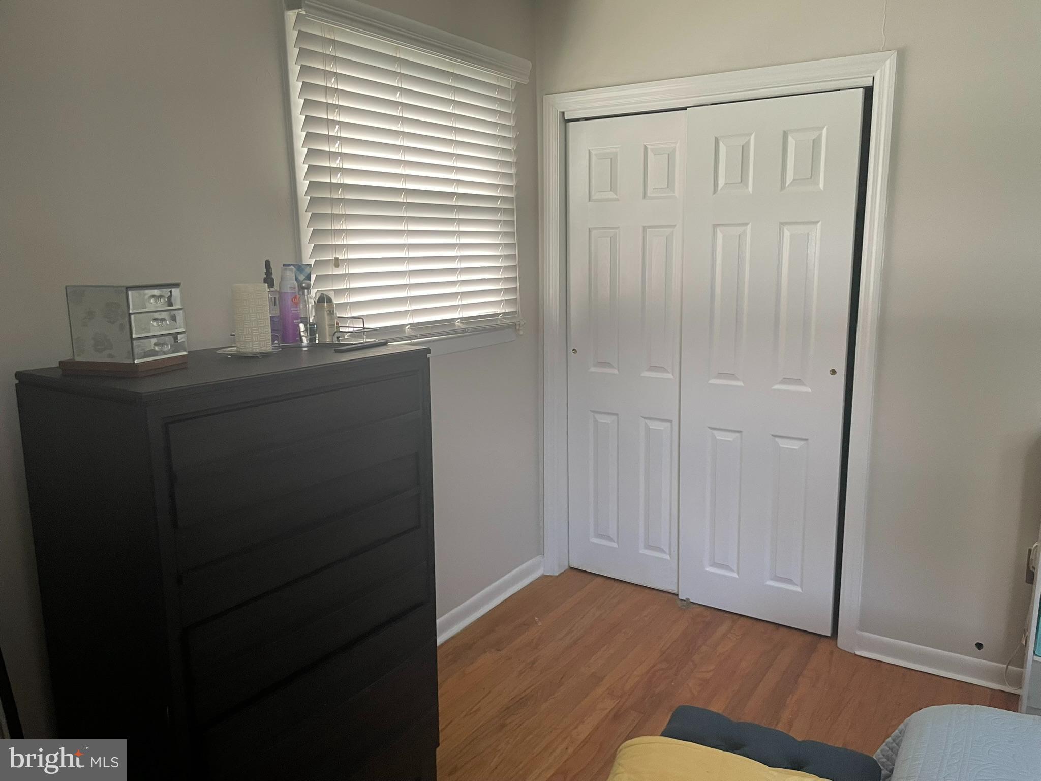 1101 Prospect Lane Somerdale, NJ 08083 - Photo 19 of 41 a view of an empty room with wooden floor and a window