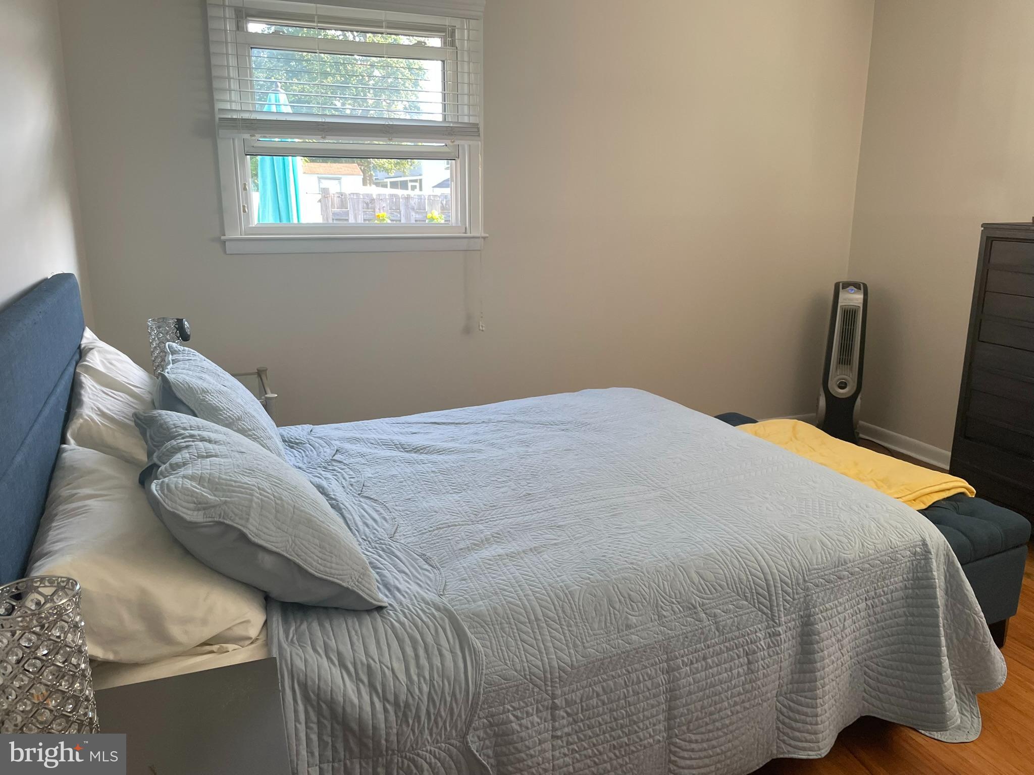1101 Prospect Lane Somerdale, NJ 08083 - Photo 20 of 41 a bed sitting in a bedroom next to a window
