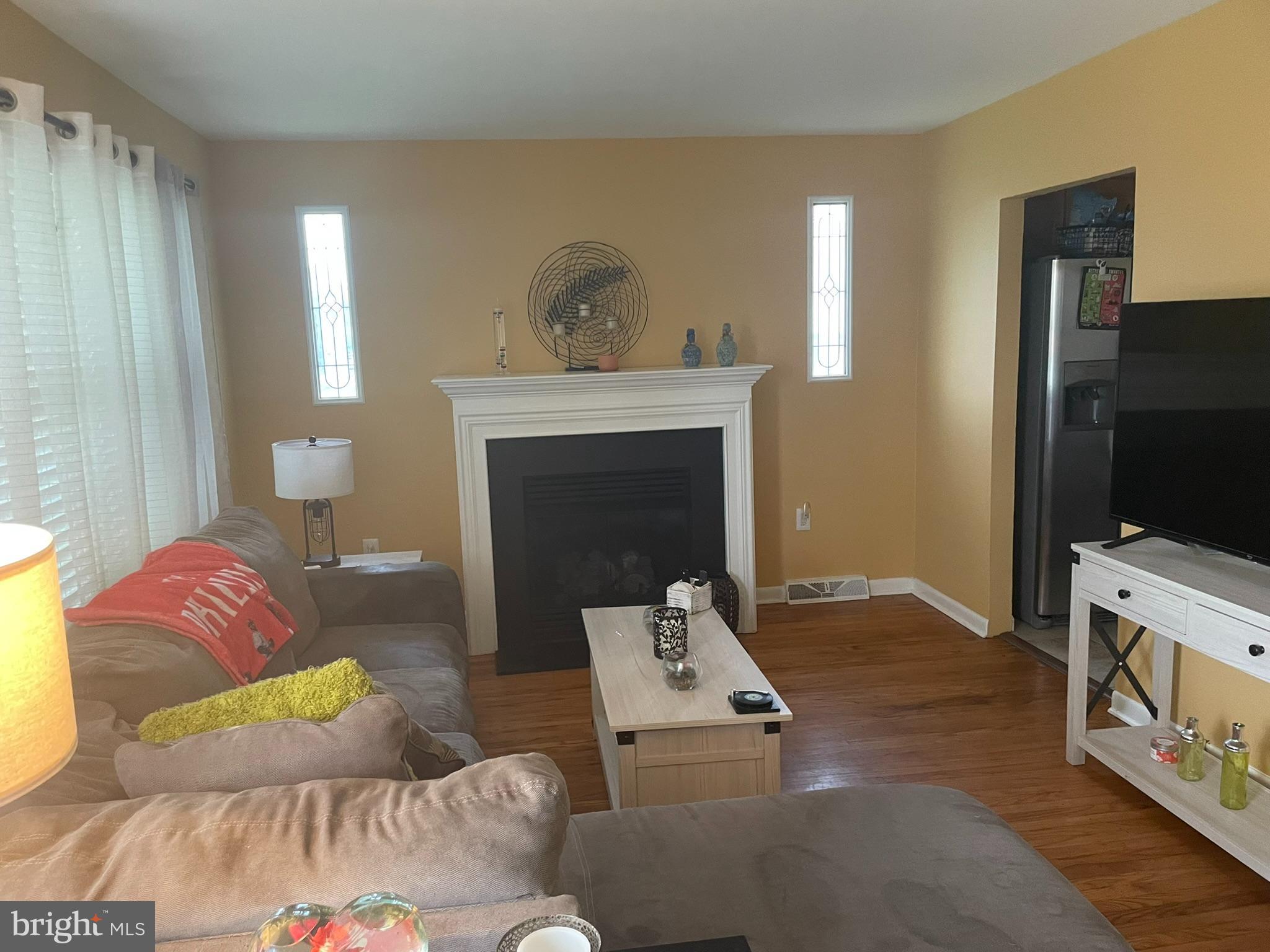 1101 Prospect Lane Somerdale, NJ 08083 - Photo 4 of 41 a living room with furniture and a flat screen tv