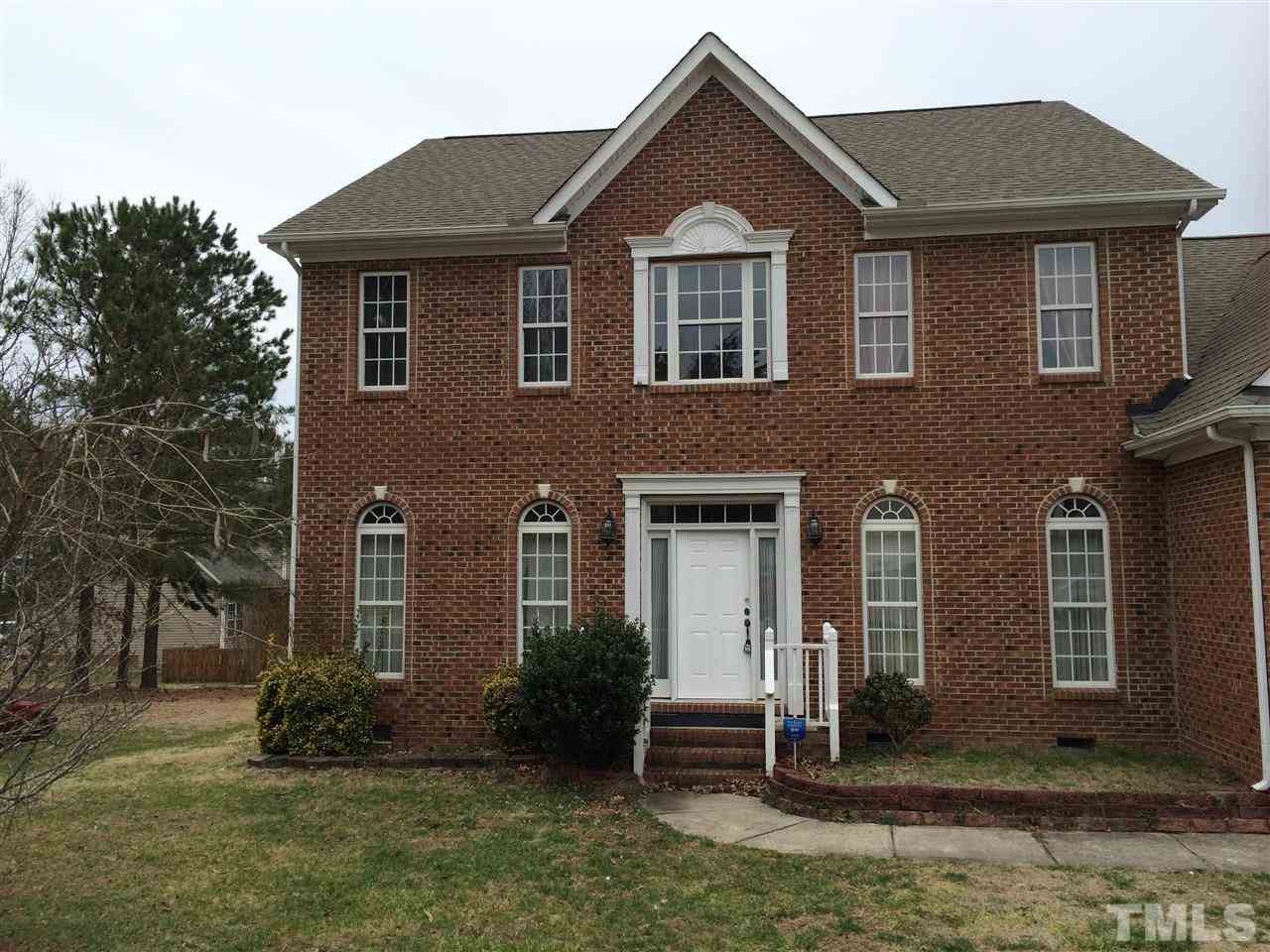 3405 Pritchard Court Raleigh, NC 27616 - Photo 1 of 11 a front view of a house with a yard