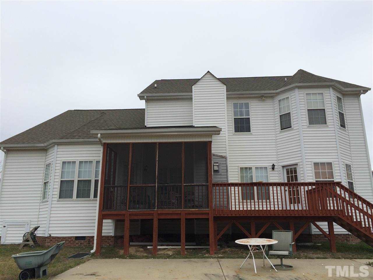 3405 Pritchard Court Raleigh, NC 27616 - Photo 2 of 11 a front view of a house with a balcony
