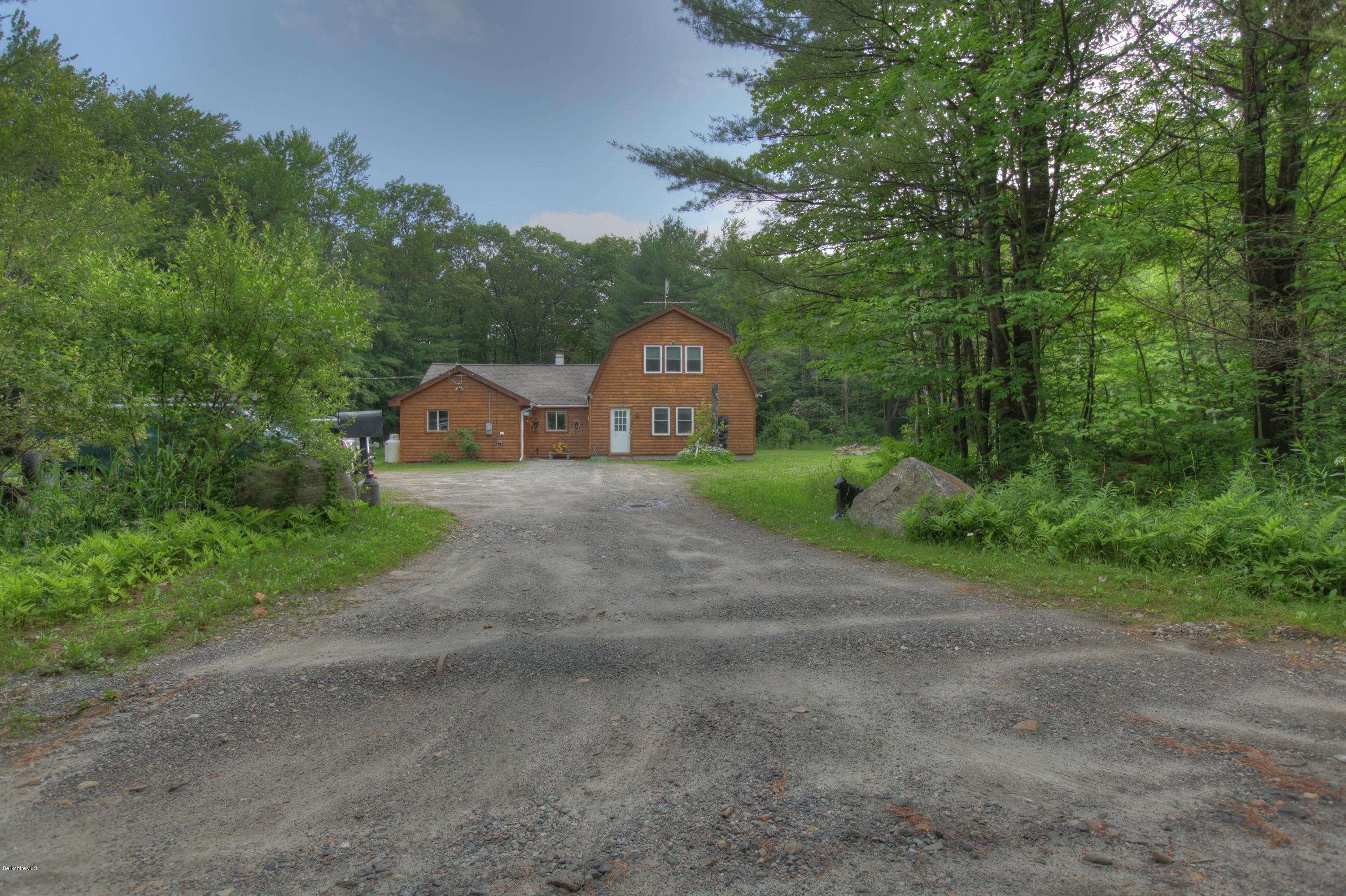 702 Becket Road Otis, MA 01029 - Photo 22 of 22 a view of a road with a large trees