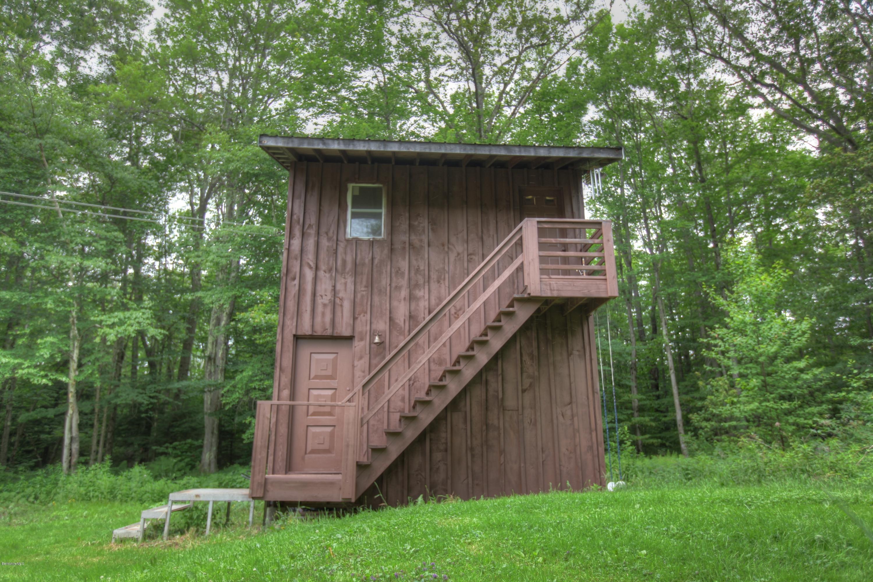 702 Becket Road Otis, MA 01029 - Photo 5 of 22 a view of backyard with green space