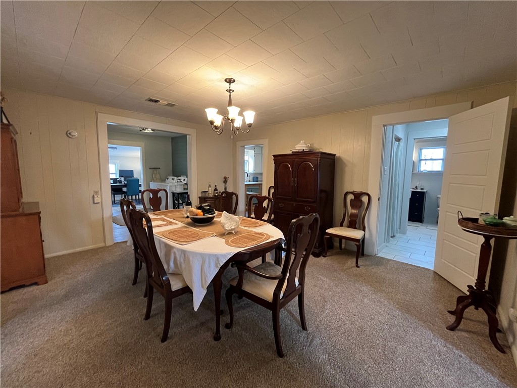 1102 North Travis Avenue Cameron, TX 76520 - Photo 18 of 48 a view of a dining room with furniture