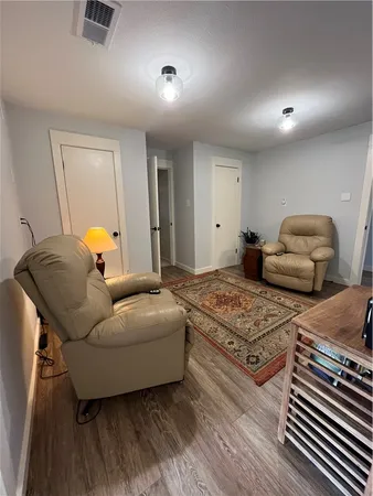 a living room with furniture and a couch