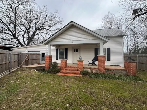 a view of house with patio