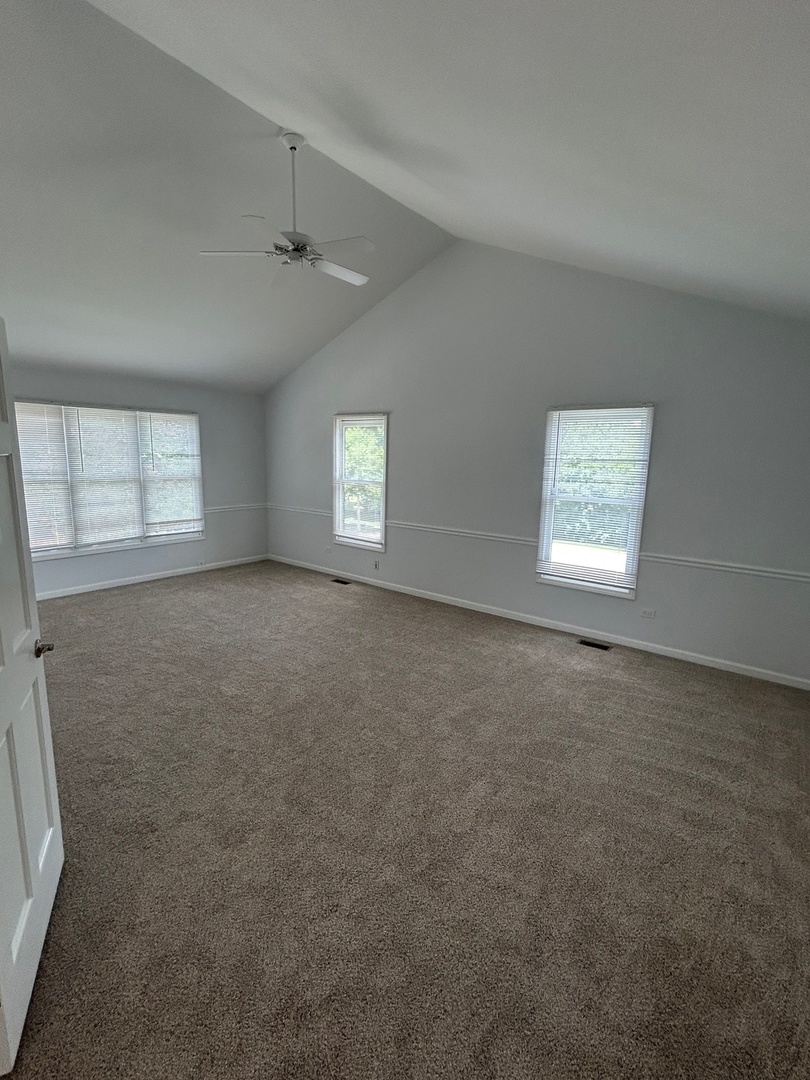 105 Golfview Circle Prospect Heights, IL 60070 - Photo 20 of 23 an empty room with windows
