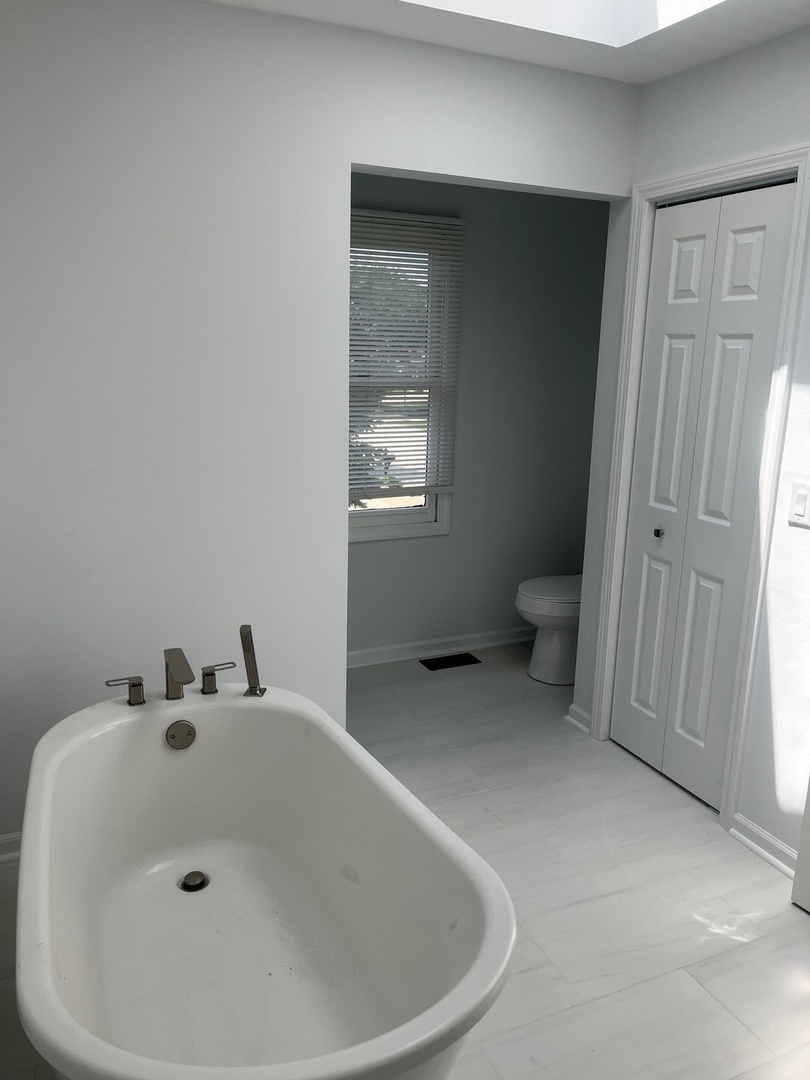 105 Golfview Circle Prospect Heights, IL 60070 - Photo 21 of 23 a bathroom with a sink and a toilet