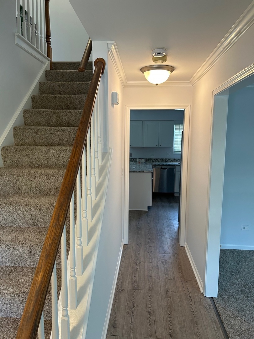 105 Golfview Circle Prospect Heights, IL 60070 - Photo 6 of 23 a view of entryway and hall with wooden floor