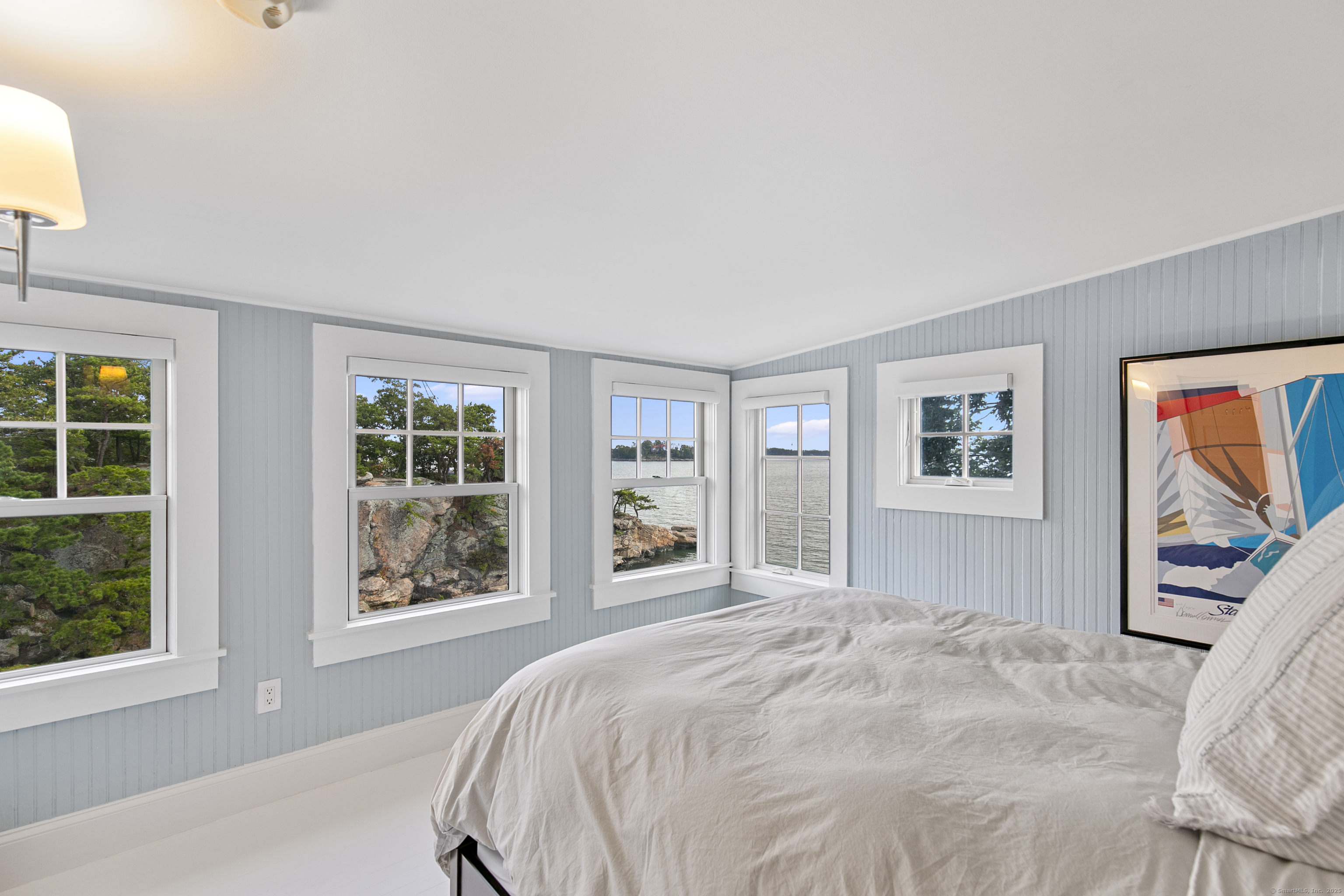 33 Thimble Farms Road Branford, CT 06405 - Photo 20 of 40 a bedroom with a large bed and a window
