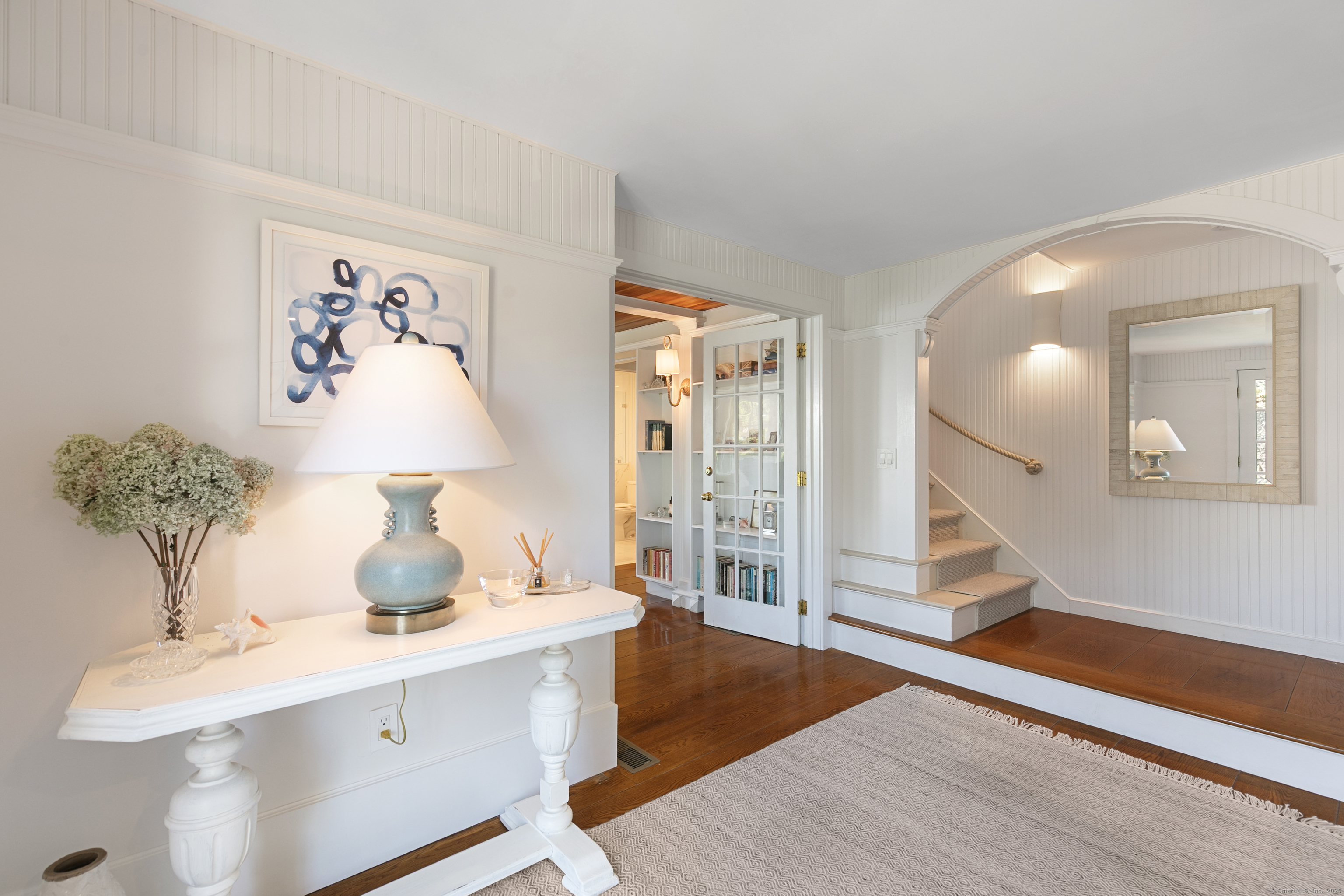33 Thimble Farms Road Branford, CT 06405 - Photo 2 of 40 a view of a bedroom with wooden floor and cabinet