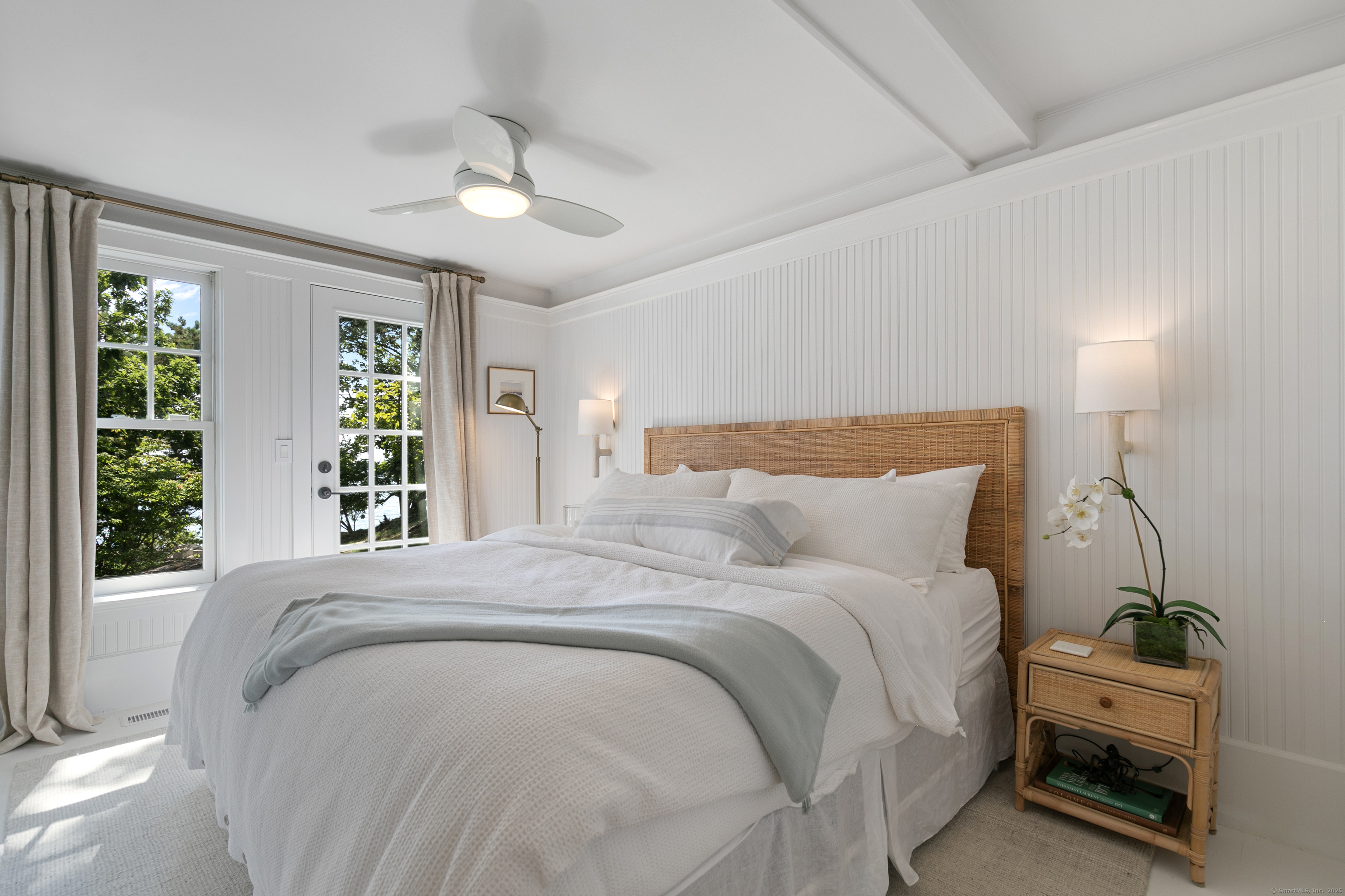 33 Thimble Farms Road Branford, CT 06405 - Photo 30 of 40 a bedroom with a bed and a large window