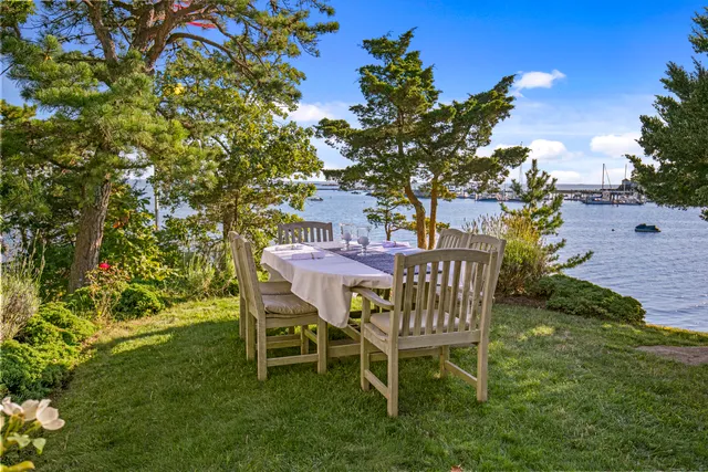 a table and chairs in a garden