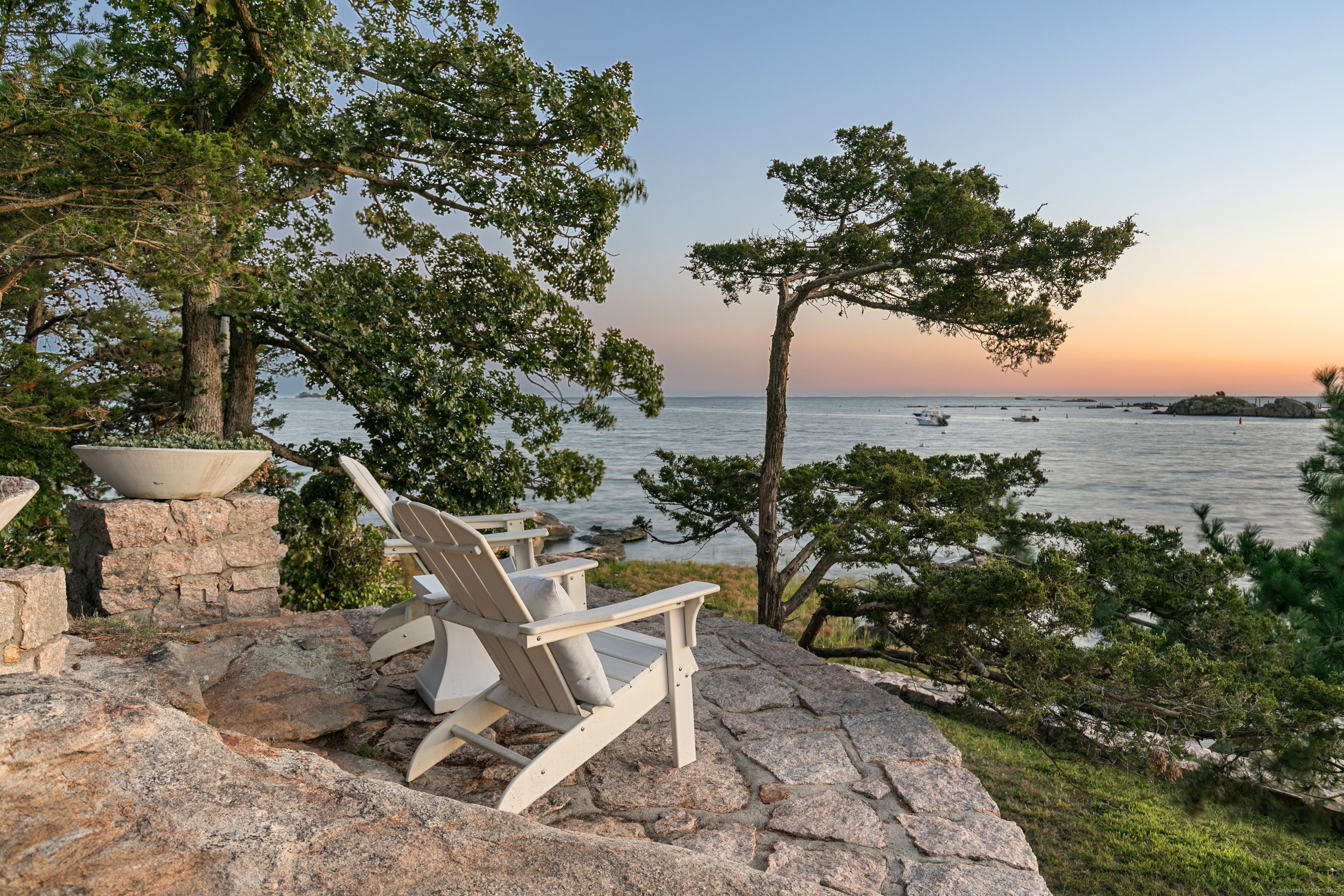 33 Thimble Farms Road Branford, CT 06405 - Photo 37 of 40 a view of a chairs and table in the patio