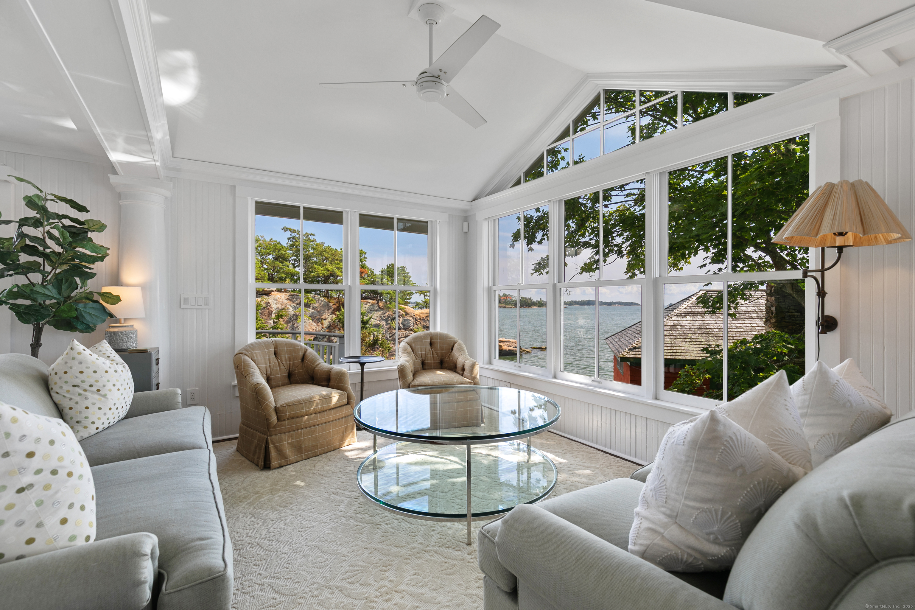 33 Thimble Farms Road Branford, CT 06405 - Photo 4 of 40 a living room with furniture and a large window