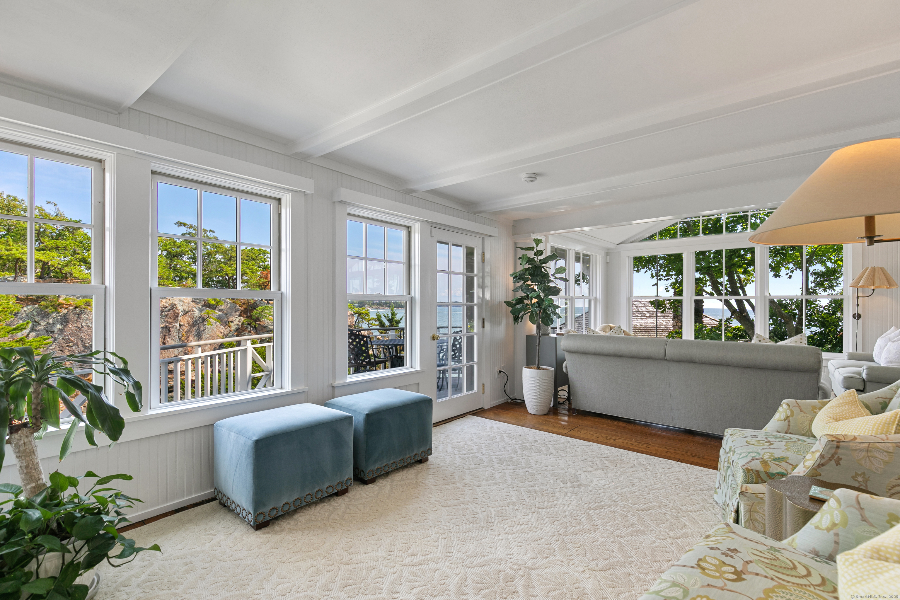 33 Thimble Farms Road Branford, CT 06405 - Photo 5 of 40 a living room with furniture and a potted plant