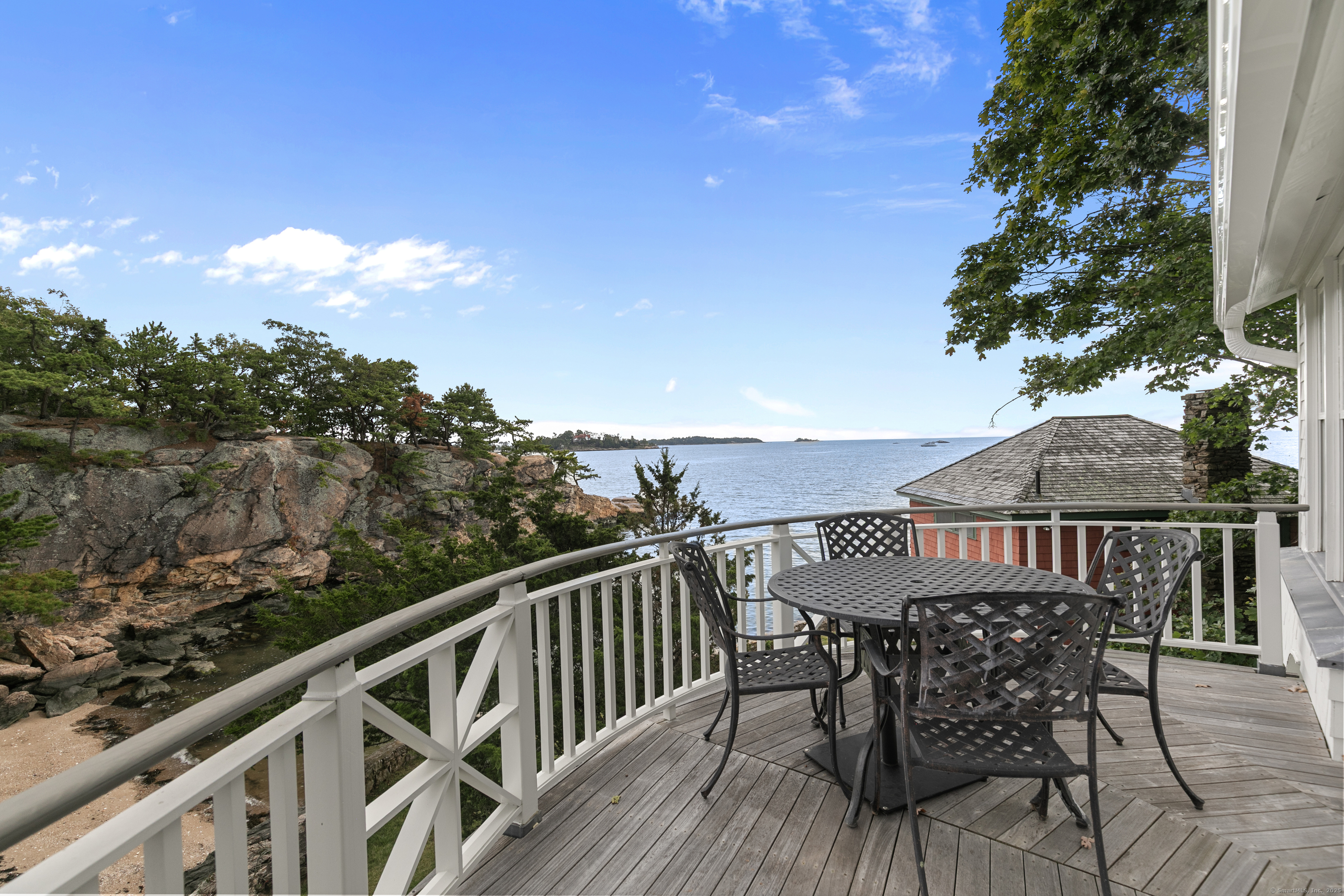 33 Thimble Farms Road Branford, CT 06405 - Photo 7 of 40 a view of a balcony with furniture
