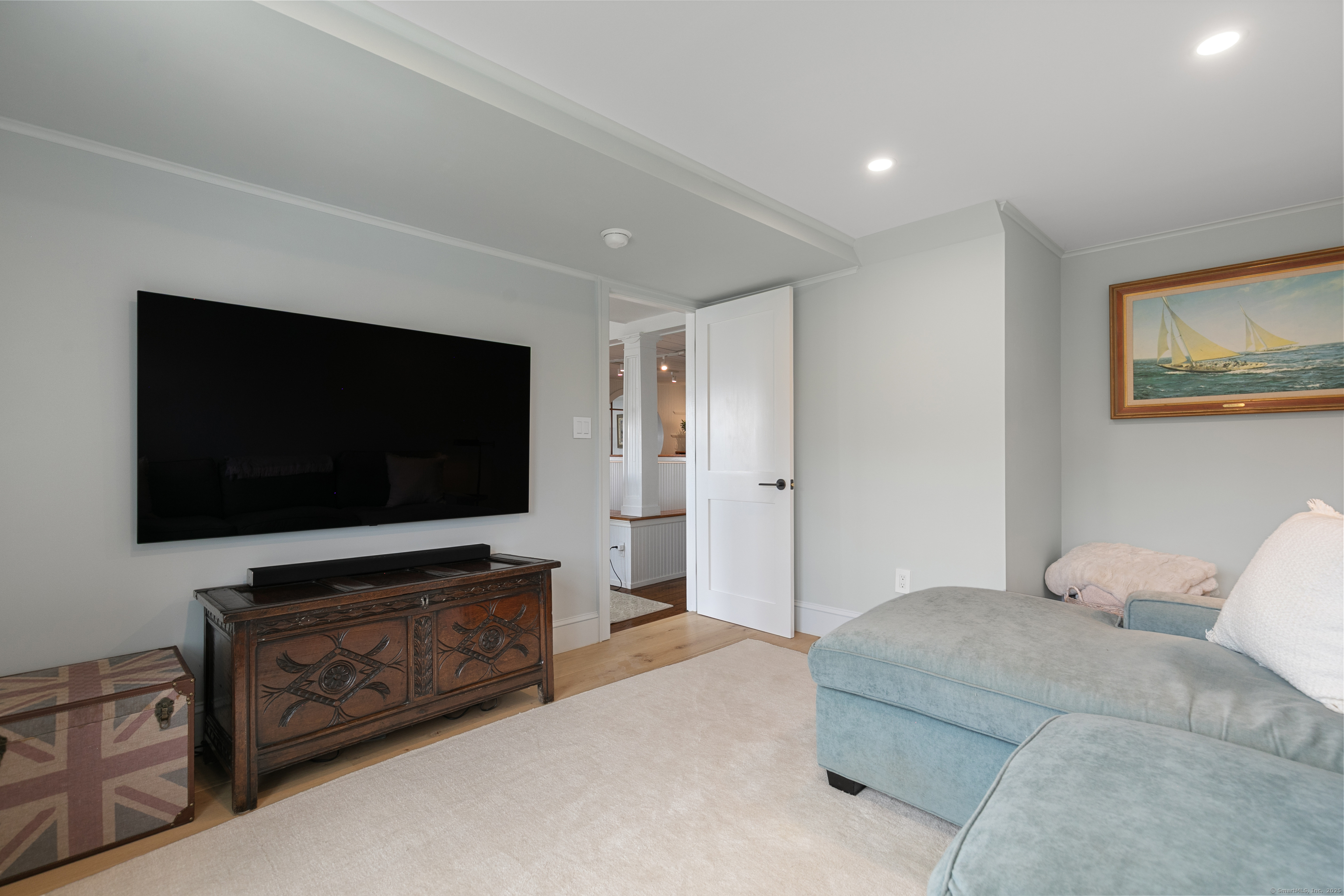 33 Thimble Farms Road Branford, CT 06405 - Photo 9 of 40 a living room with furniture and a flat screen tv