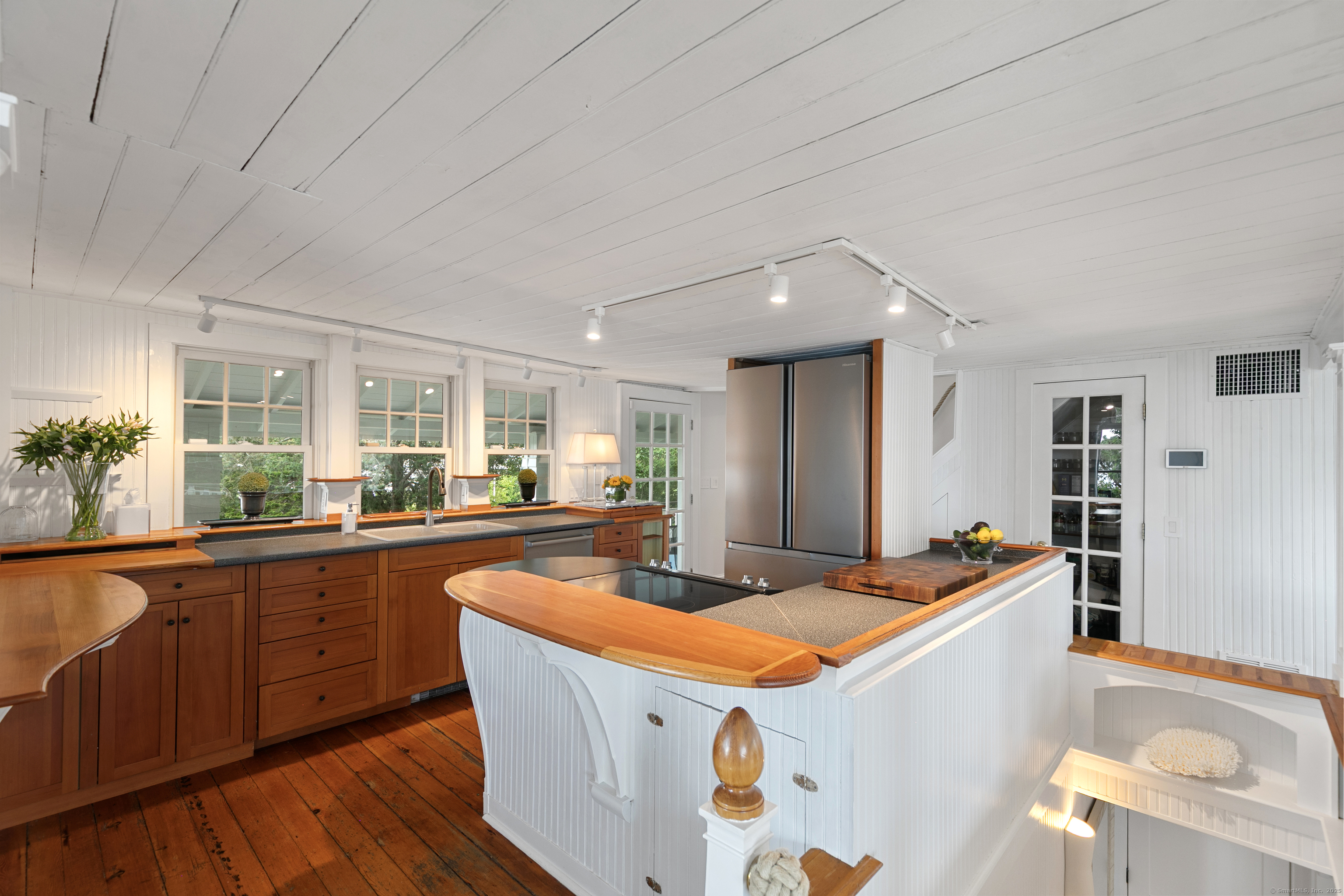 33 Thimble Farms Road Branford, CT 06405 - Photo 10 of 40 a kitchen with stainless steel appliances granite countertop a sink and a stove