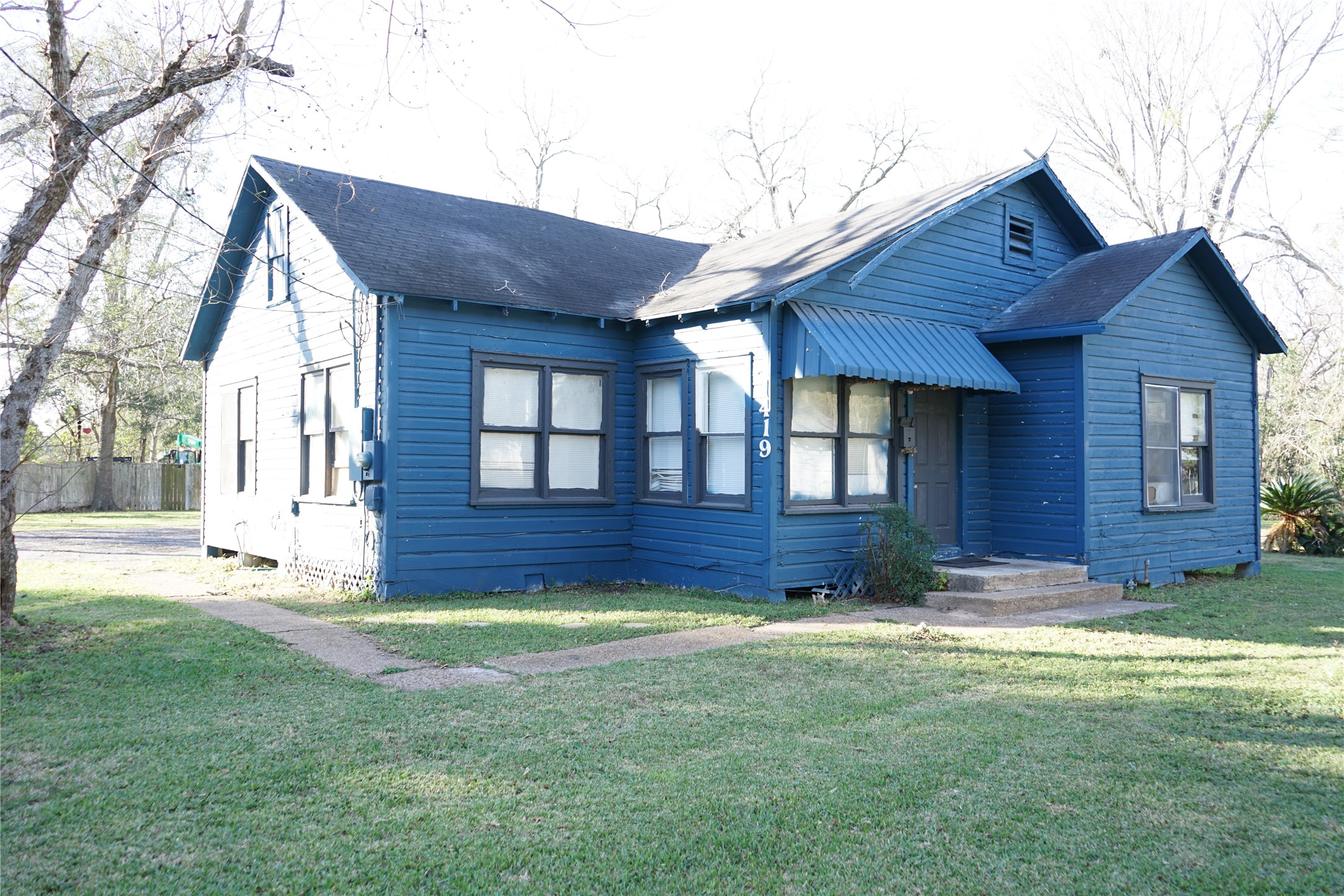 1419 Leaman Avenue Rosenberg, TX 77471 - Photo 1 of 17 a view of a house with a yard