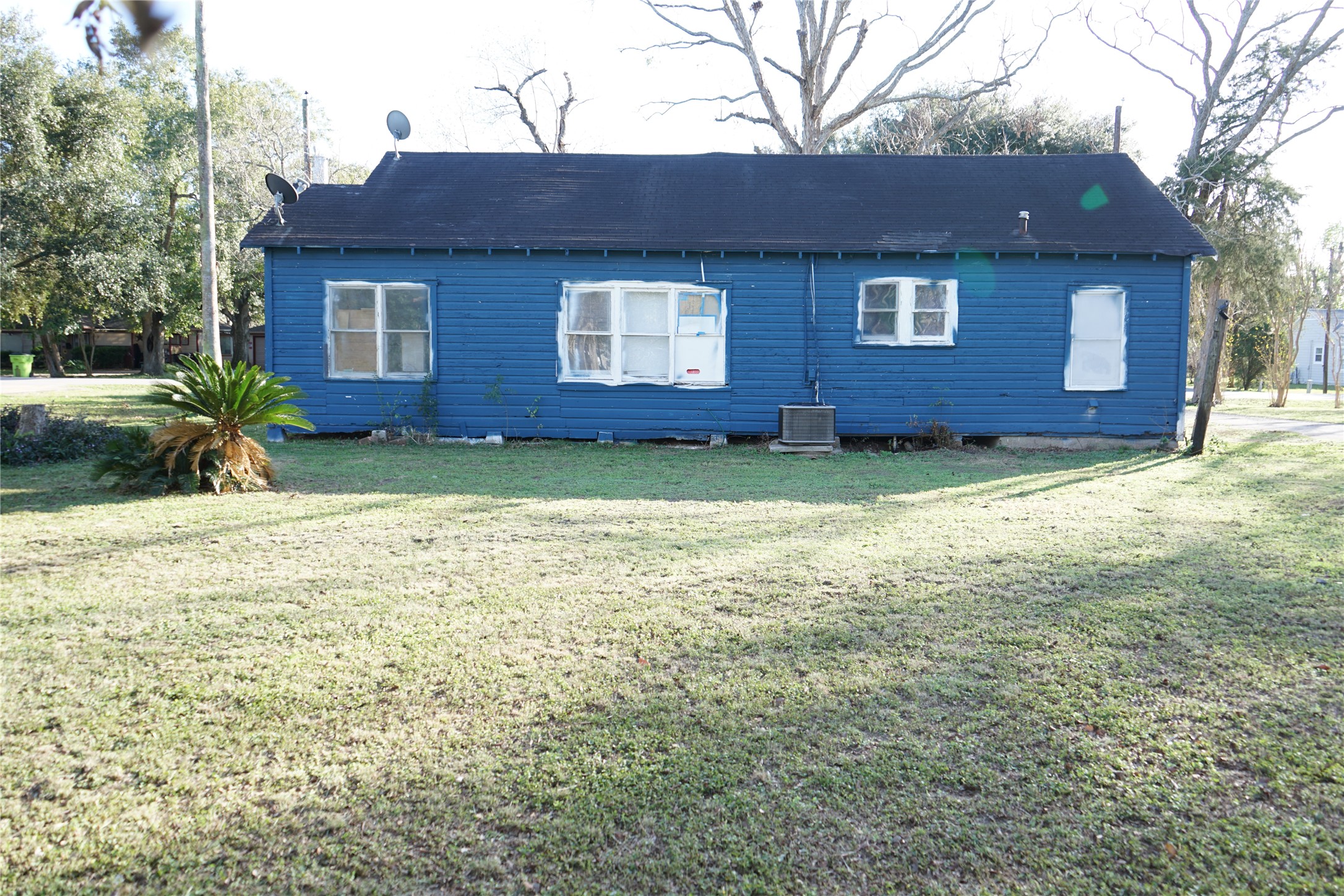 1419 Leaman Avenue Rosenberg, TX 77471 - Photo 15 of 17 a view of a house with a yard