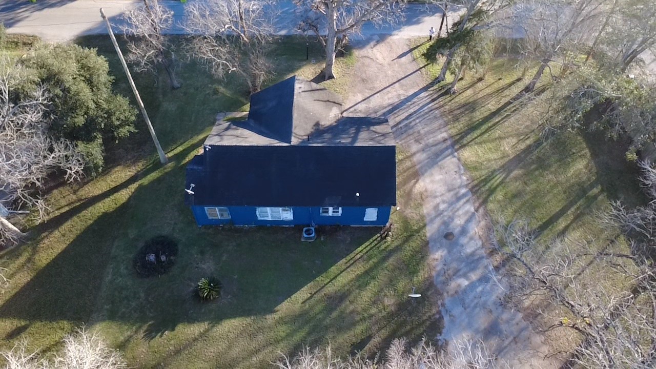 1419 Leaman Avenue Rosenberg, TX 77471 - Photo 16 of 17 a view of a house with a yard