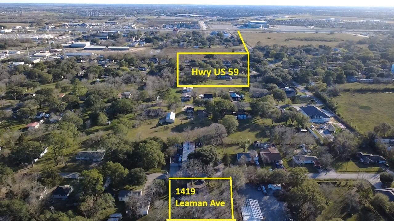 1419 Leaman Avenue Rosenberg, TX 77471 - Photo 17 of 17 an aerial view of residential building and lake