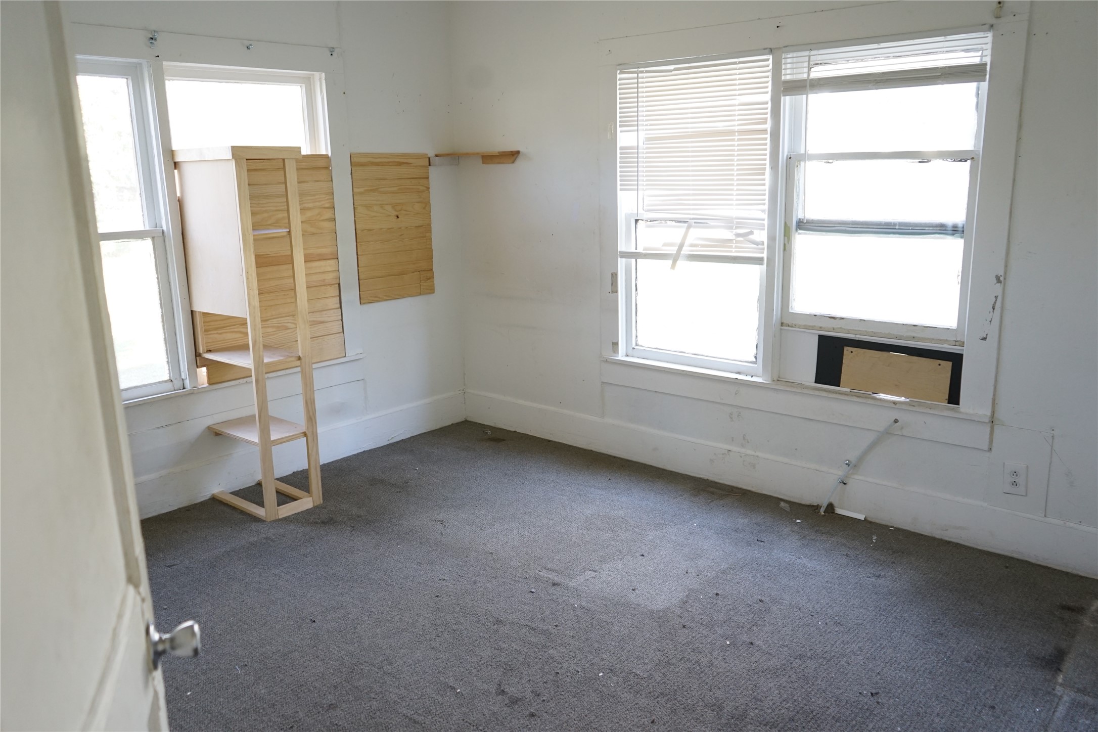 1419 Leaman Avenue Rosenberg, TX 77471 - Photo 10 of 17 a view of an empty room with a window