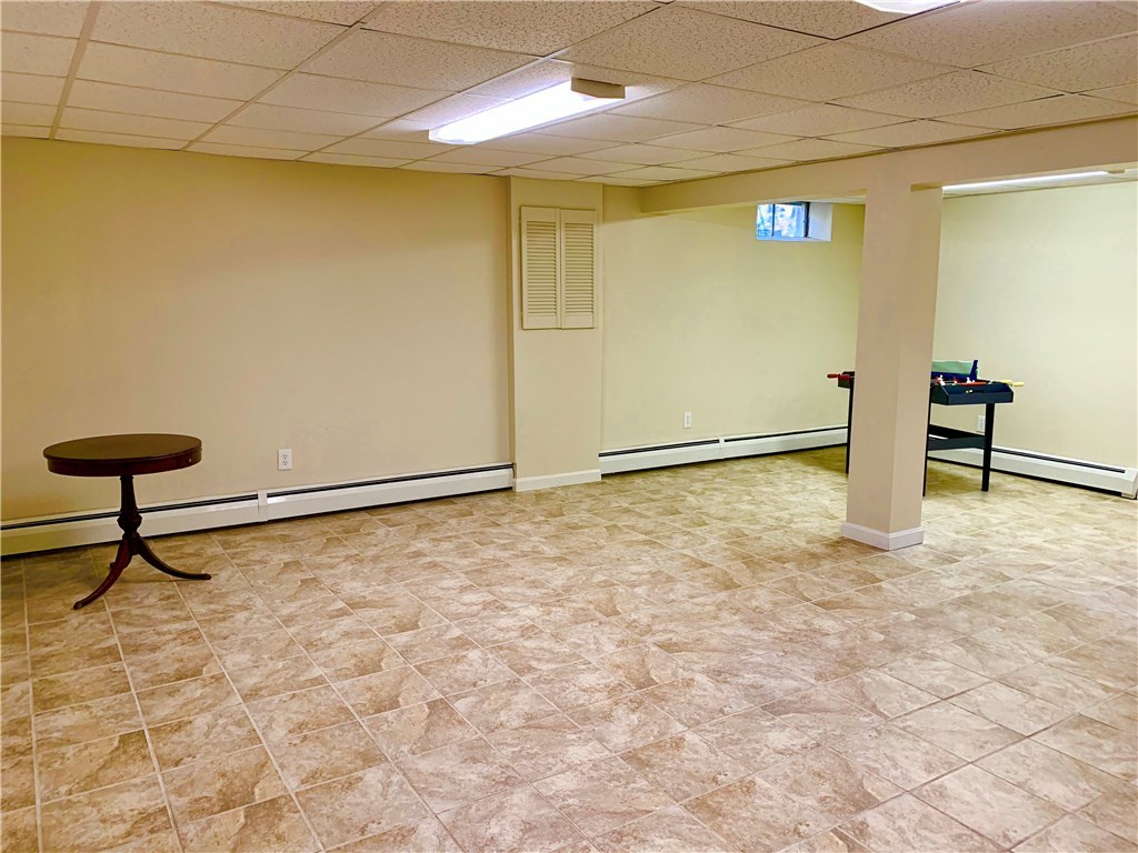 8 Cynthia Road Lincoln, RI 02865 - Photo 18 of 28 Finished heated lower level huge space for recreation or media room etc.