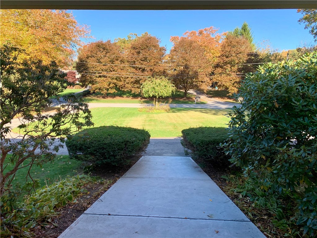 8 Cynthia Road Lincoln, RI 02865 - Photo 25 of 28 Grand view of the stately front yard and U shaped driveway.