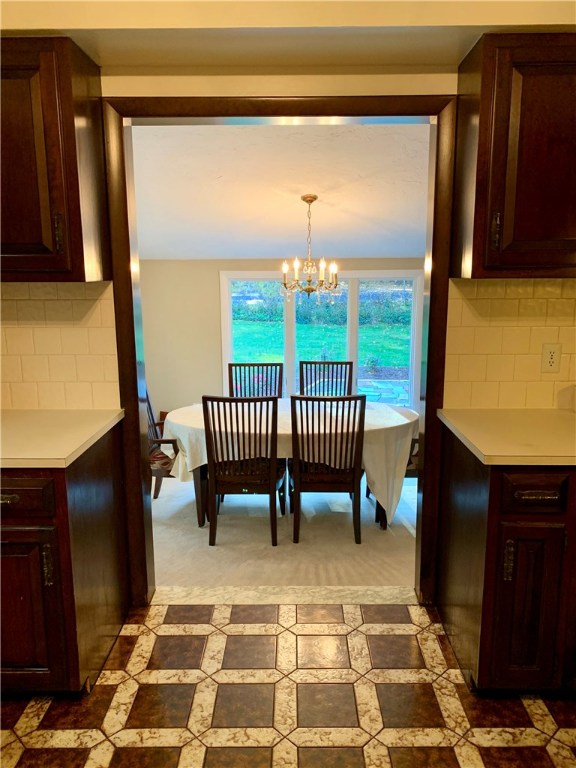 8 Cynthia Road Lincoln, RI 02865 - Photo 10 of 28 Breakfast area overlooking yard and patio