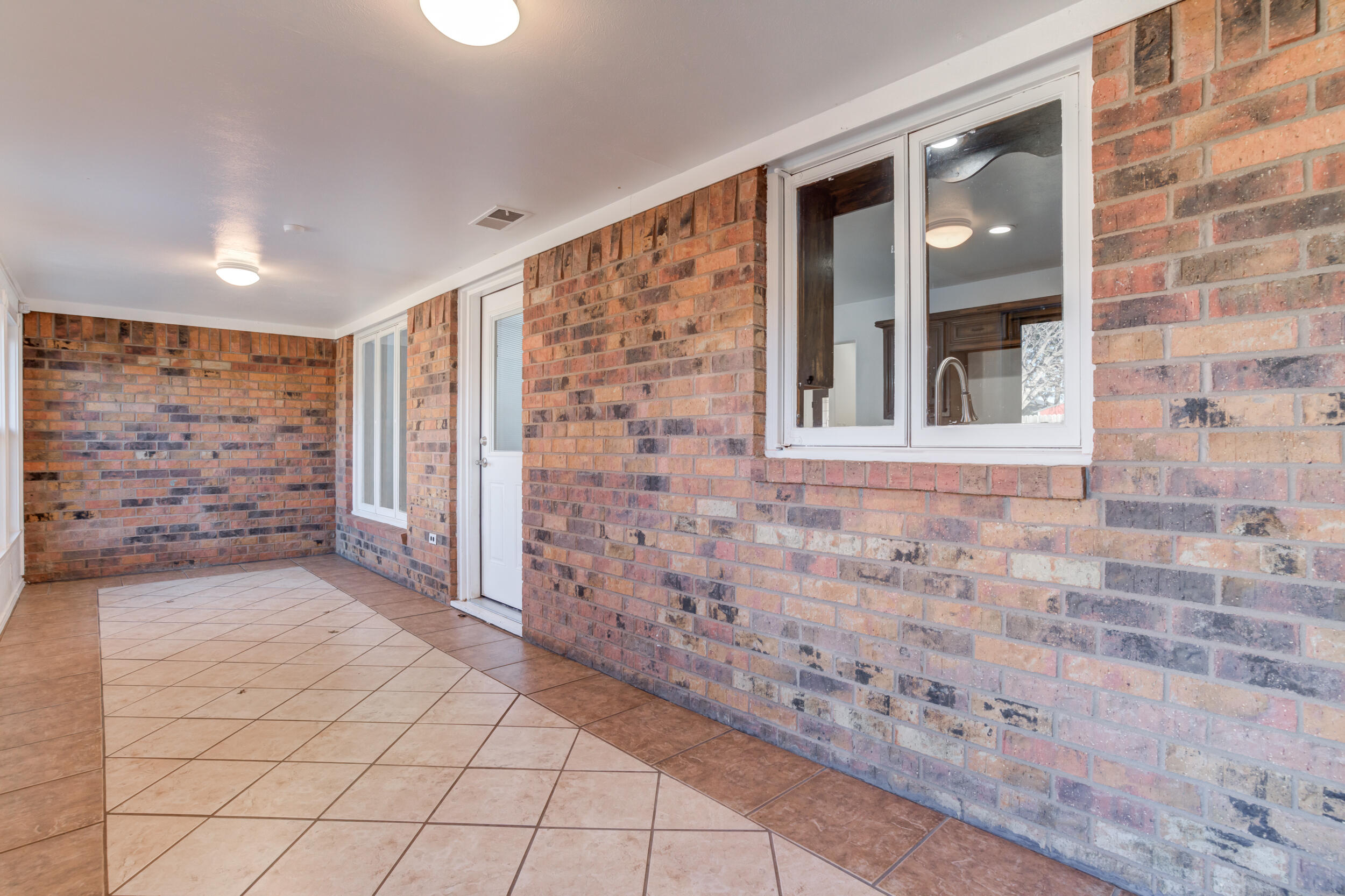 5504 73rd Street Lubbock, TX 79424 - Photo 22 of 39 a view of front door with furniture